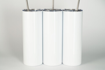Three blank Skinny Tumbler Mockup on isolated background. 20 oz straight tumbler