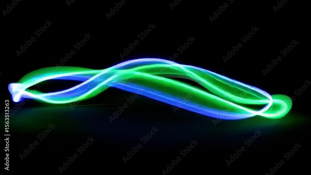 Poster dynamic illumination vibrant display of fluid light trails in blue and green, creating abstract moti