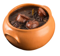 Brazilian feijoada in a rustic clay bowl