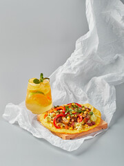 Fajitas in tortilla with chicken, cheese, bell pepper, corn and lettuce