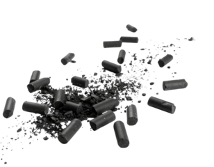 Broken black chalk pieces with scattered powder isolated on white background