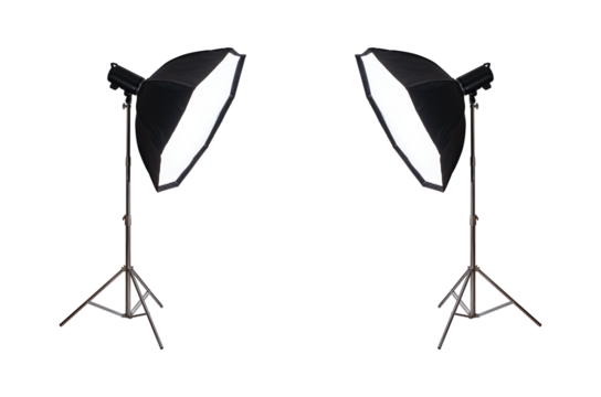Studio flash with softbox on stainless steel tripod isolated.