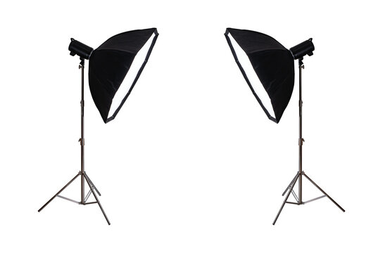 Studio flash with softbox on stainless steel tripod isolated.