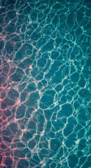 Obraz premium Glistening Teal Waters: Abstract Water Surface Reflections with Delicate Red Highlights, Serene Pool Reflections: Abstract Play of Light and Shadow on Teal Water Surface