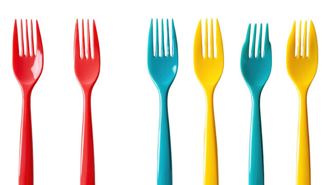 Colorful forks in vibrant hues arranged in playful order, creating a cheerful atmosphere for dining and celebration on transparent background