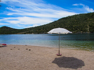 Fototapeta premium A little shade at the beach in Croatia