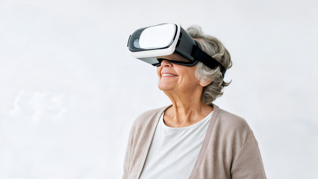 An old woman wearing virtual reality glasses. Virtual reality. close-up - Powered by Adobe