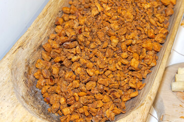 Traditional Balkans Cuisine Pig Rind Cvarci in Bulk Tray