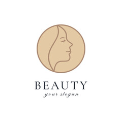 Minimalist beauty logo with female face outline in circle