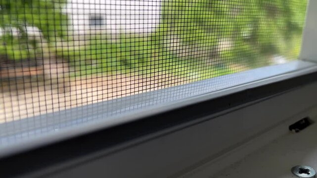 Fly screen mosquito net attached to window frame for insect protection