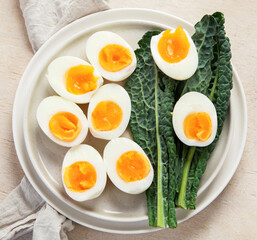 Plate with halves of delicious boiled eggs.