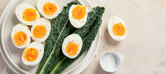 Plate with halves of delicious boiled eggs.