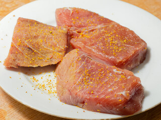 Spiced raw tuna fish meat