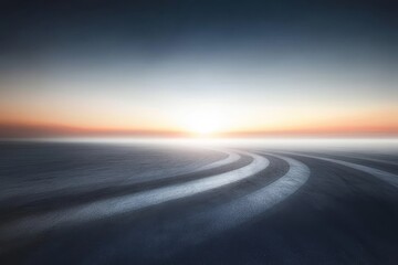 Curved Road Leading to a Distant Horizon at Sunset