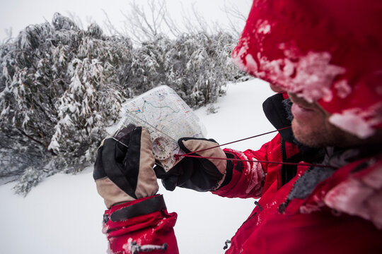 Checking the map whilst winter hiking
