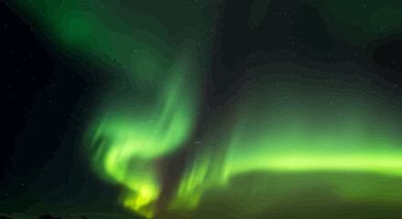 Spectacular display of the aurora borealis with vibrant green and yellow hues
