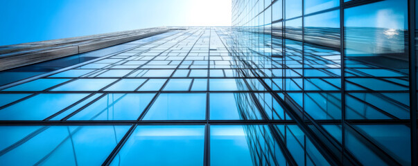 Obraz premium Glass Building Against Blue Sky