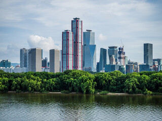 Seoul, South Korea - July.02.2025: Skyscrapers in Yeouido and Bamseom in the Han River in Seoul