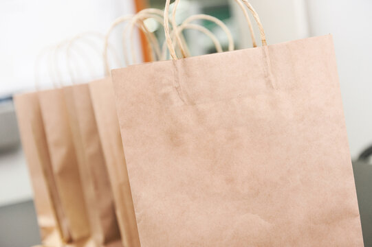 Shopping bags in plain brown paper