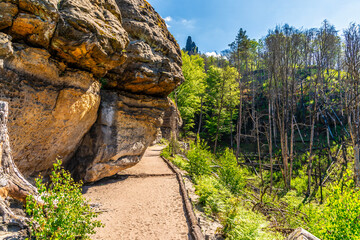 A view of rocks obstructing the middle section of the path leading to the Pravcicka Gate arch in...