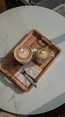 A crescent moon shining brightly amidst dark clouds in a deep blue night sky above the horizon