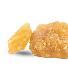 Brown sugar, a natural sweetener or crystalline sugar lumps isolated on transparent background