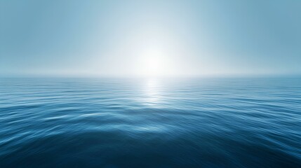 Obraz premium Ocean Horizon Serenity: A mesmerizing panoramic view of the calm ocean, stretching to meet the soft horizon and bathed in the ethereal glow of sunlight