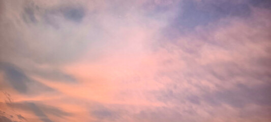 In the evening. the sky and clouds are orange.
