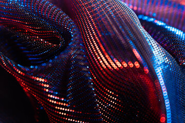 Shimmering Red and Blue Sequin Texture – Close-Up of Reflective Dotted Surface with Bokeh Lights...