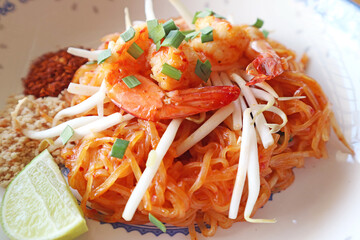 Plate of Delectable Pad Thai Noodle Served with Fresh Vegetables