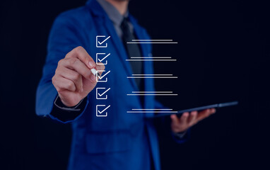 Businessman mark checkboxes, Survey form, check marks on checklist,Checklist concept.