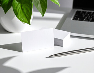 Business card design showcase on a modern desk environment featuring clean lines and minimalist aesthetic for professional branding