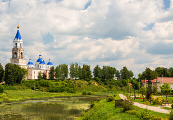 Kashin, Tver region, Russia - 9 July 2021: Scenic cityscape Kashin town in summer, Resurrection Cathedral on bank of the Kashinka River