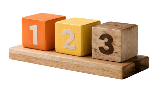 Wooden blocks displaying the numbers one, two, and three.