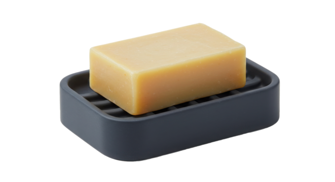 Bar soap on dark gray soap dish
