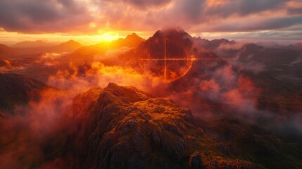 Fiery mountain sunrise; misty peaks, target-like light