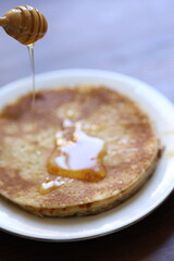 honey and egg pancakes in close-up