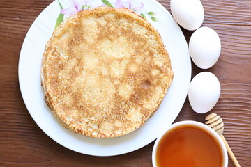 honey and egg pancakes in close-up