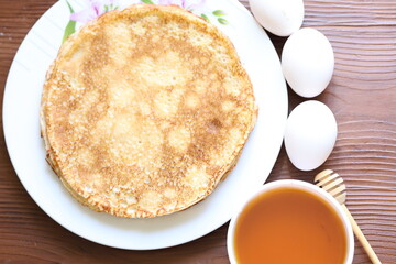 honey and egg pancakes in close-up
