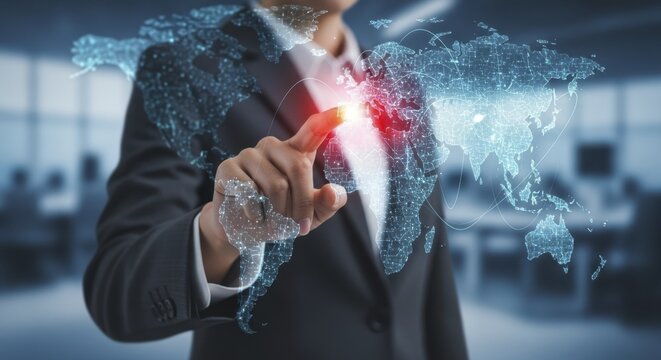 Businessman touching glowing holographic world map for global business network and digital communication