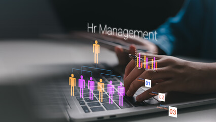 Hr manager working on laptop with futuristic human resource management chart and data analytics. Concept of digital HR solution and employee structure.