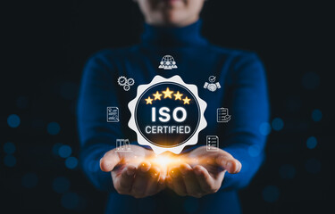 ISO certification standard assurance concept. Woman holding ISO certified with icon of quality...