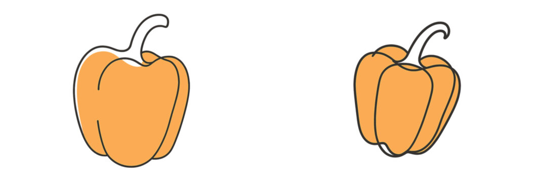 Bright orange bell peppers stand out against a clean white background showcasing their vibrant color and smooth texture