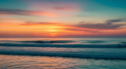 Obraz premium Gentle Ocean Sunset Featuring Teal and Blue-Green Tones