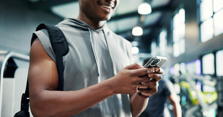 Hands, cellphone and man in gym, fitness and wellness with digital app for progress. Happy person,...