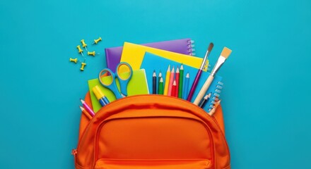 Bright Orange Backpack Filled With Assorted School Supplies Ready For Learning