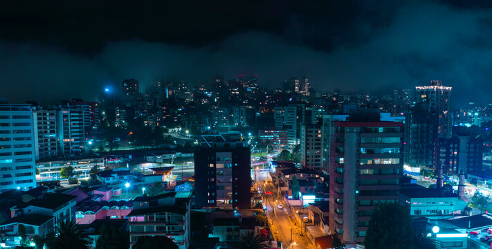 Panoramic night view of modern buildings in the northern part of Quito