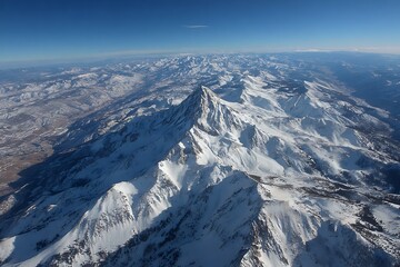 Fototapeta premium Elegant mountain peak snowy aerial view landscape 