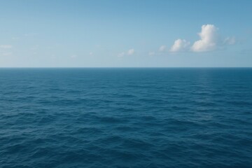 Fototapeta premium A large body of water with a cloudy sky in the background