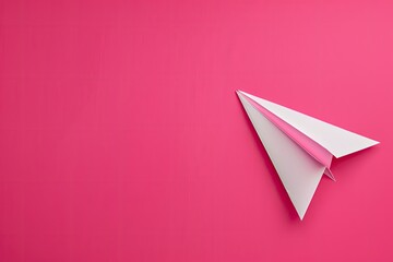 Vibrant Color Picture of Paper Plane Near Magenta Stationery